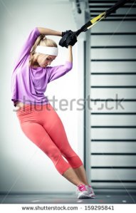 stock-photo-young-woman-streching-muscles-functional-training-159295841